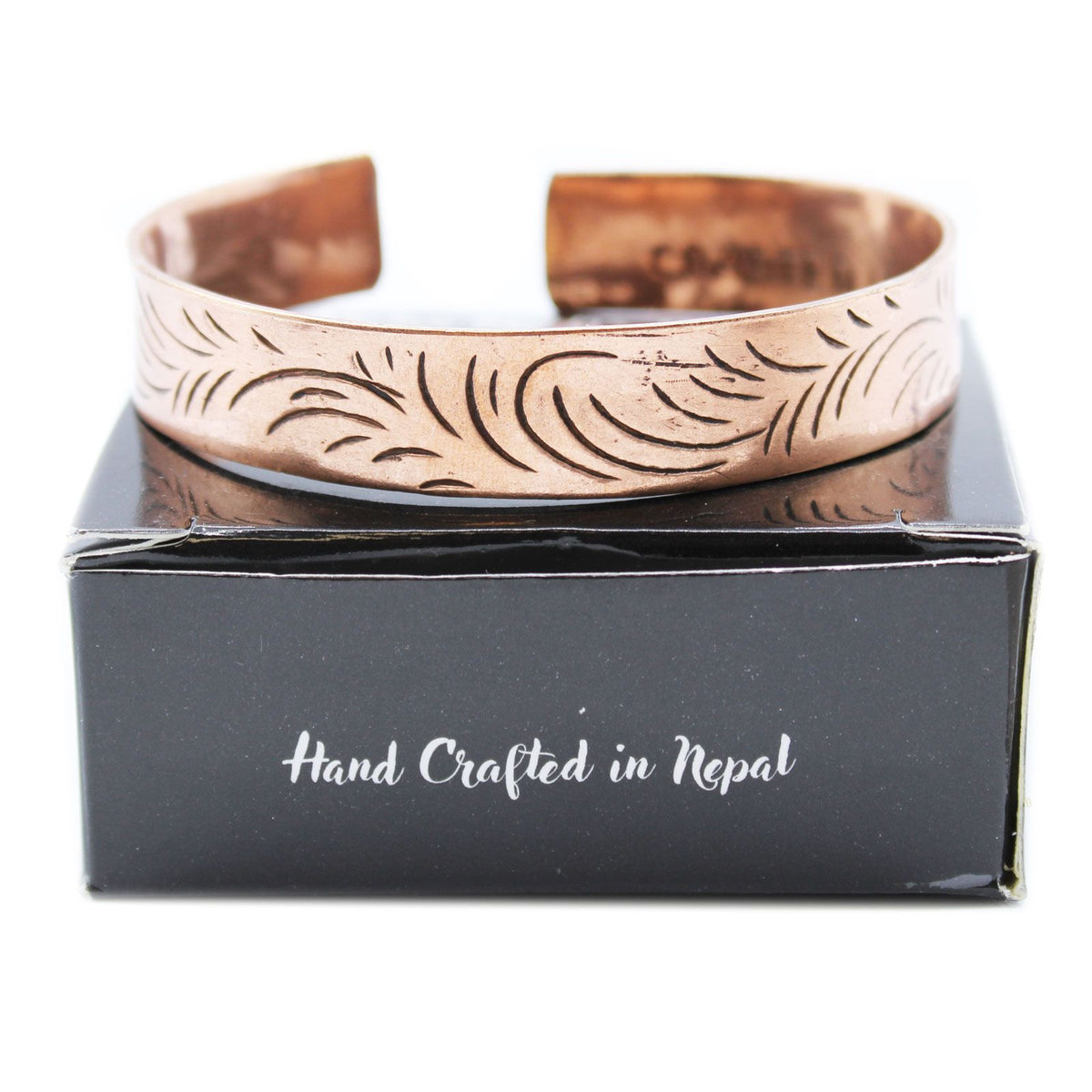 Pulsera tibetana de cobre · Remolinos tribales anchos