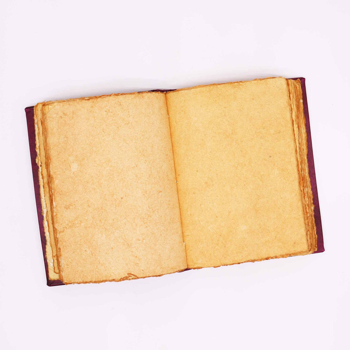 Cuaderno de cuero rojo · Hamsa de zinc