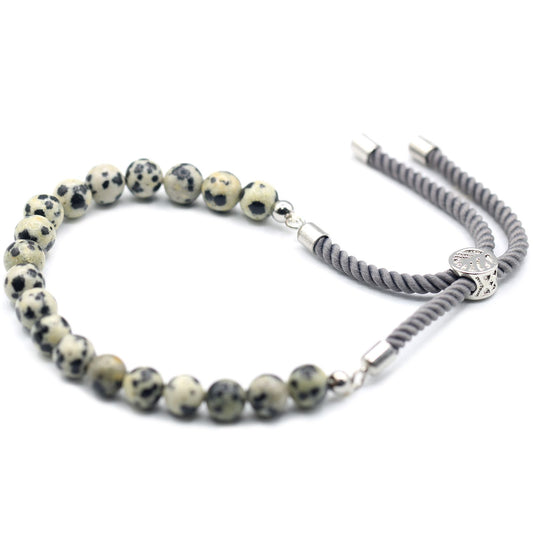 Pulsera de hilo gris con jaspe dálmata · Ajustable