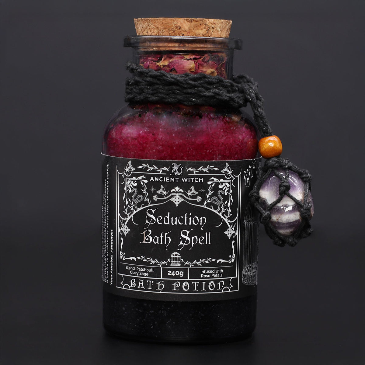Poción de baño de bruja antigua con amuleto de amatista · Seducción