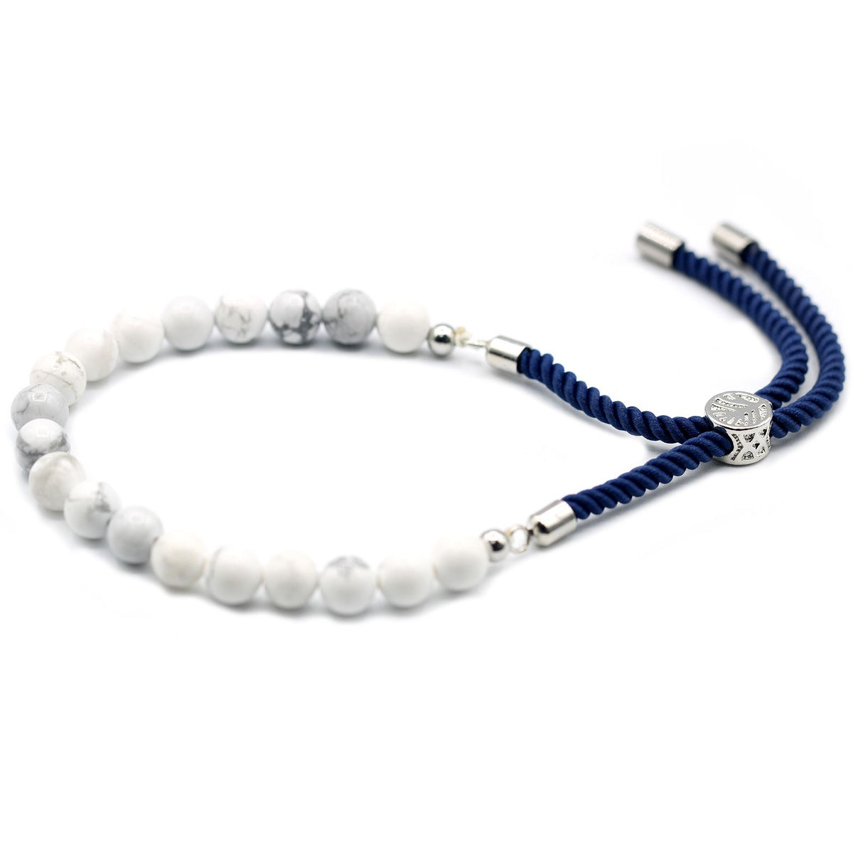 Pulsera de hilo azul marino con howlita blanca · Ajustable