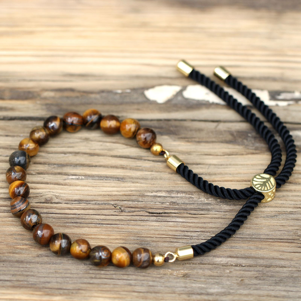 Pulsera de hilo negro con Ojo de Tigre